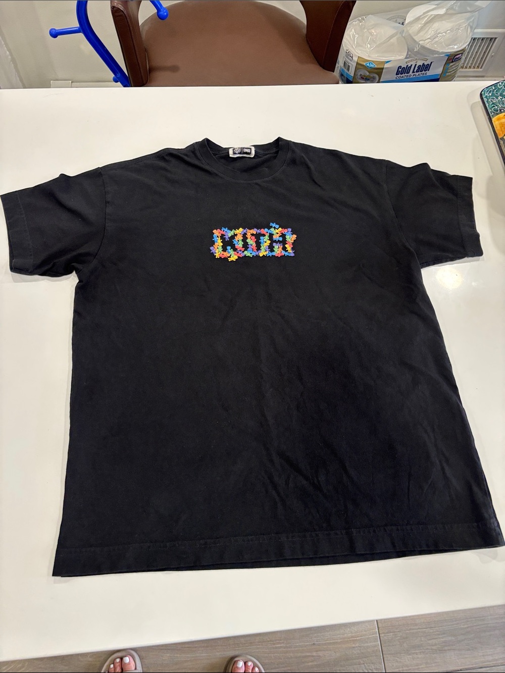 Kith Black Tee With White Label Graphic View 2